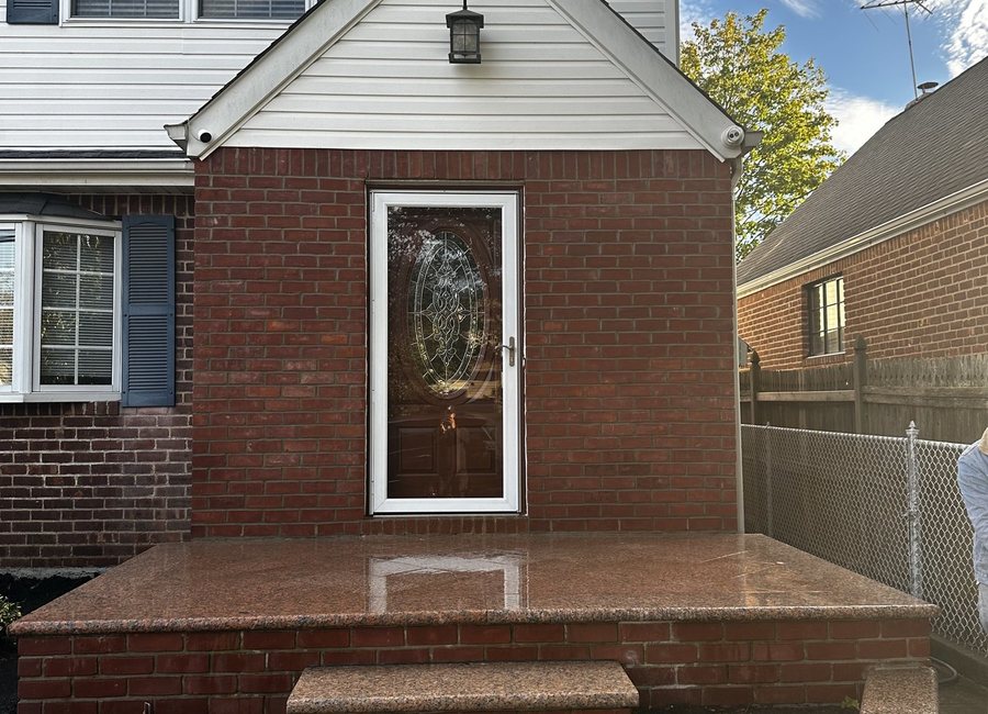 Finished brick entry and facade work