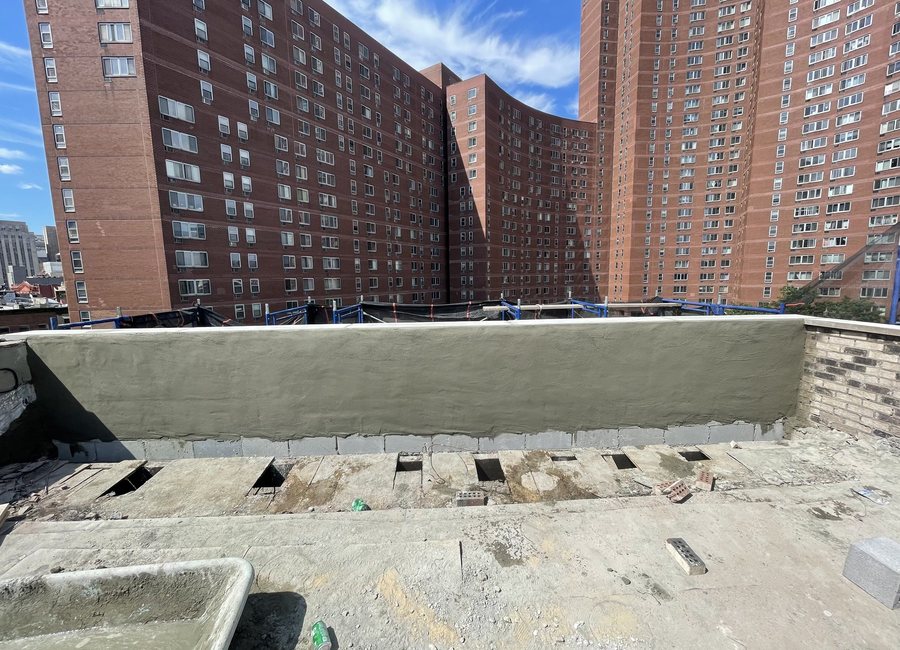 Completed roof or parapet waterproofing surface
